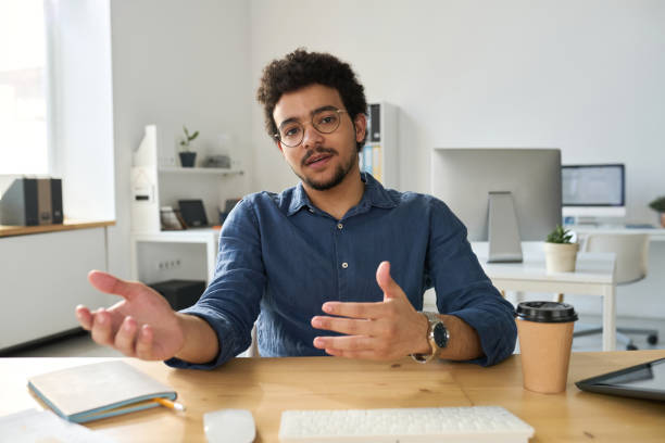 istock Businessman having video call with colleagues 1499663447