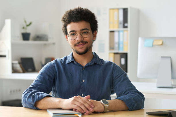 istock Young businessman working in office 1499663450