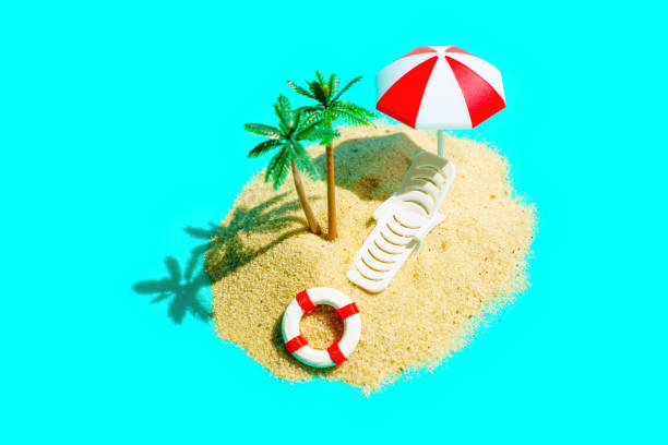 istock Miniature Sandy Beach Island with Toy Palm Trees 1499664624