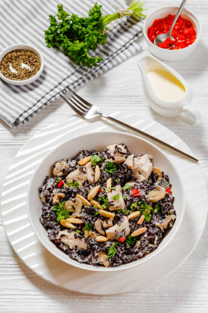 istock black rice with cream, chicken, mushrooms, almonds 1499664851