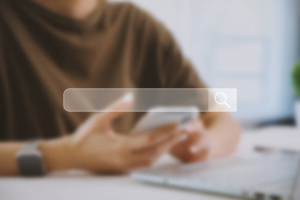 istock Browsing Internet Data Information. Businesswoman hand using laptop searching on blur background 1499666029