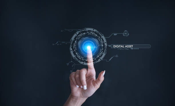 istock Finger touching some holographic graphic user interface with digital asset technology concepts. 1499666262