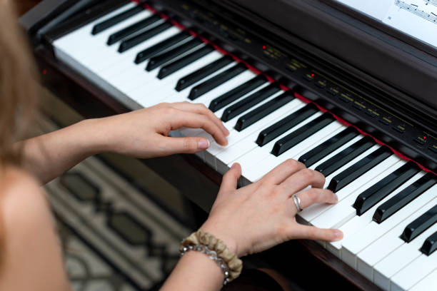 istock Emotion in Every Note: Pianist's Expressive Playing Enchants the Audience 1499668288