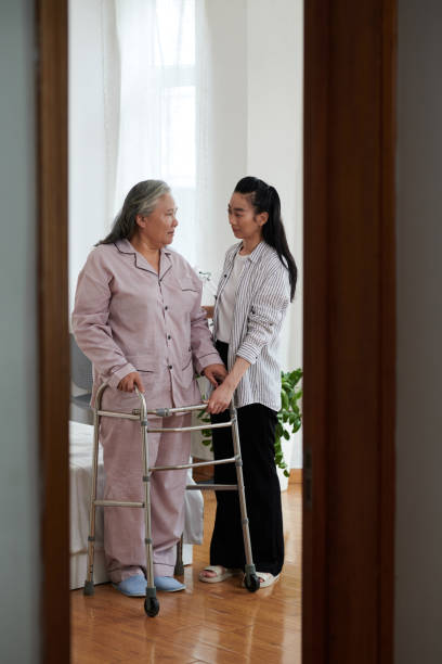 istock Daughter Helping Senior Mother 1499668908