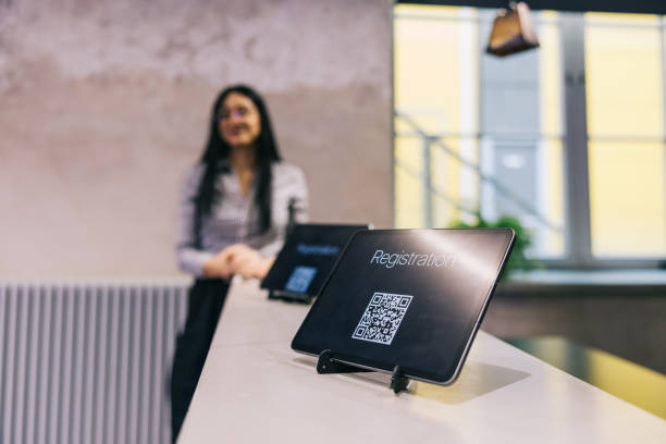 istock Close up shot of conference registration tablet with QR- code. 1499669441