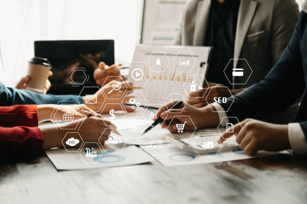 istock Business team present professional investor working new start up project. Digital tablet laptop computer Finance managers meeting with digital marketing media in virtual icon 1499669698