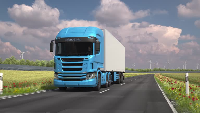 electric semi truck driving along a country road with solar panels in background