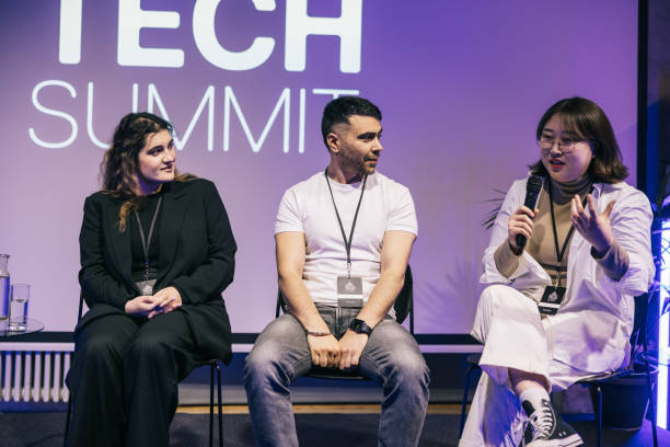 istock A group of multi ethnic entrepreneurs, making a great panel discussion on stage. 1499670308