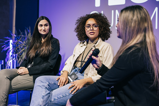 Seated side by side, a panel of inspiring female entrepreneurs representing different ethnicities engages in a thought-provoking discussion. Their collective wisdom and experiences make a great discussion for the audience.
