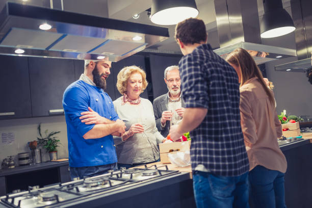 istock Cooking Class Fun: A Group of People Enjoying a Culinary Adventure 1499678968