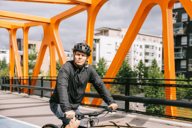 istock Bike Messenger riding with loaded cargo bike 1499680456