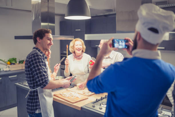 istock Cooking Class Fun: A Group of People Enjoying a Culinary Adventure 1499681927