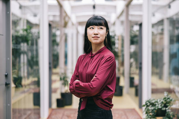 young japanese businesswoman with smart casual attire at the office. - ceo corporate business indoors lifestyles imagens e fotografias de stock