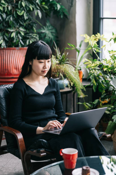 istock Female freelancer working from cozy cafe 1499682647