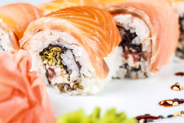 fresh sushi delight: california roll. - sushi california roll salmon sashimi zdjęcia i obrazy z banku zdjęć