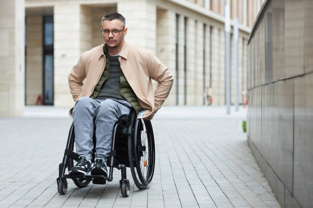 istock Man with disability walking in the city 1499688799