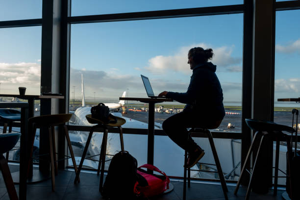istock Small Buisness Owner Working At the Departures Lounge 1499691392