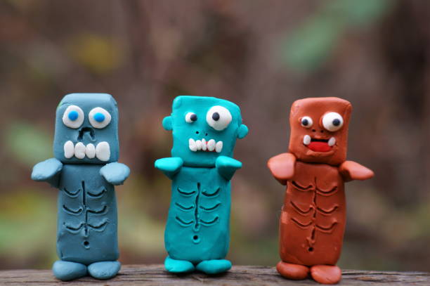 istock Funny monsters made of plasticine. 1499693585