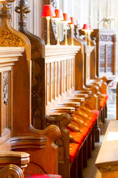 istock Wooden chorus chairs in a church 1499696671