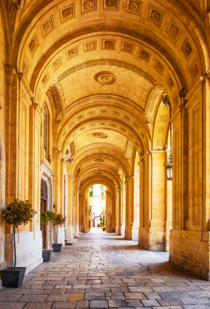 istock A Sidewalk Through Medieval Arches of a Passage in Old Town of Valletta 1499698564