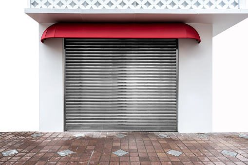Close up of stainless steel Roller shutter in the street