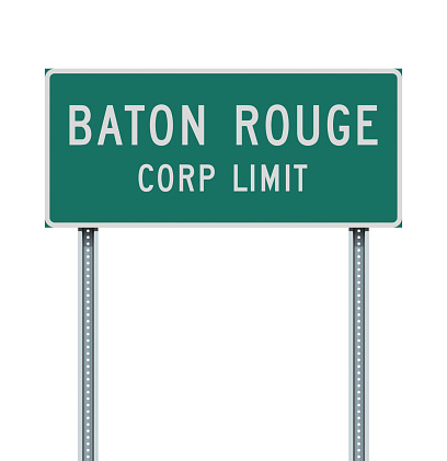 Vector illustration of the Baton Rouge (Louisiana) Corp Limit green road sign on metallic posts