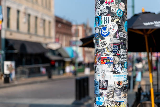 Memphis, Tennessee, USA. 6 June 2023. Stickers on a lamp post on Beale Street, Memphis