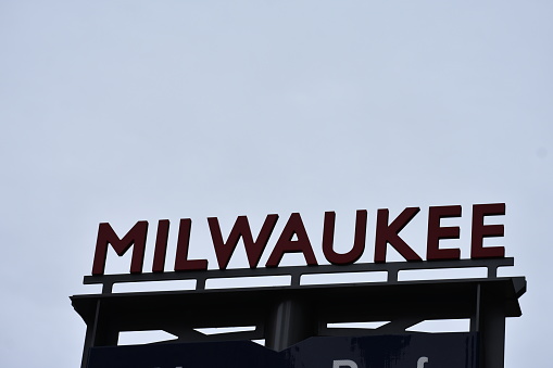 Milwaukee text sign on urban city street
