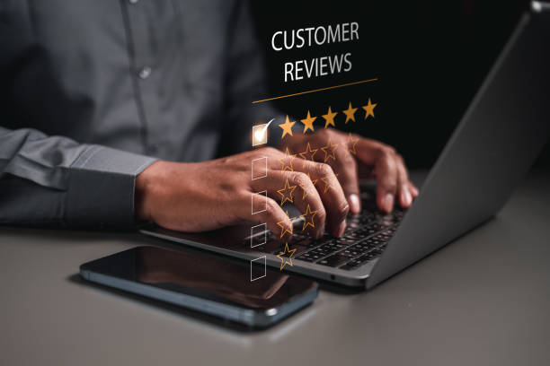istock Users rate their experience of services in an online application. Customers can evaluate the quality of service. Customer review by five star feedback. 1499705702