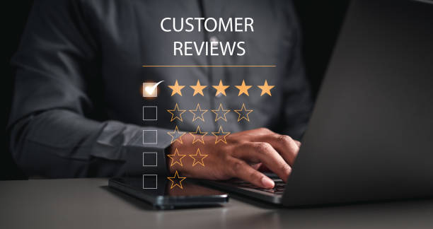 istock Users rate their experience of services in an online application. Customers can evaluate the quality of service. Customer review by five star feedback. 1499705703