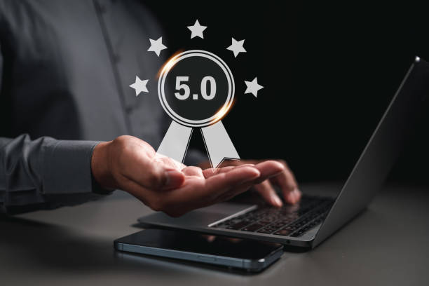 istock Businessman on hand  get rewarded five star emoticon on virtual touch screen. User comment and feedback for review. 1499705825
