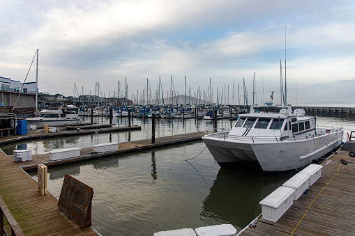 Fisherman's wharf with boats in the city of San Francisco, in the U.S. state of California, in the United States of America. USA Concept.