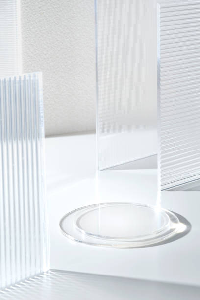 istock Transparency pedestal product display high key white background of modern Transparency strip glass with sunshine light 1499709568