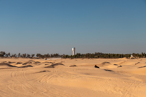 Lighthouse in the sand dunes of in Douz, Kebili, Tunisia, Africa