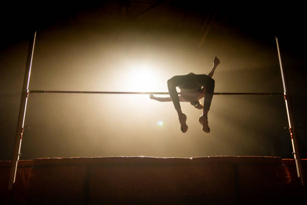istock Athlete woman doing high jump 1499712240