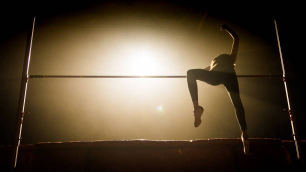 istock Athlete woman doing high jump 1499712265