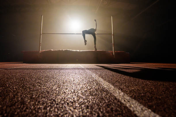 istock Athlete woman doing high jump 1499712286