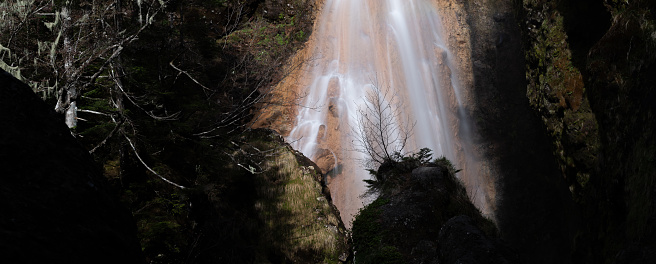 Sanbon Falls flowing through the Norikura Plateau, Nagano Prefecture