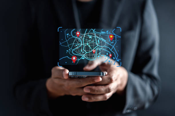 istock Businessman using smartphone searching world map with location point, GPS app, Destination travel maps and find places in the online system, searching by satellite system. 1499714966