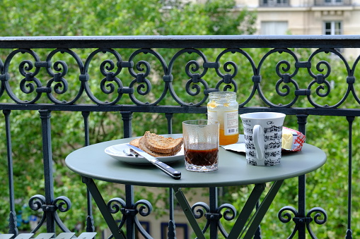 Breakfast on a Parisian balcony. June 18th, 2023, Paris, France.