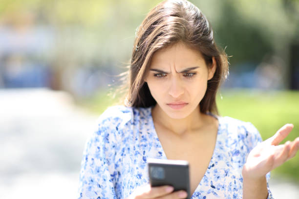istock Upset woman checking phone 1499715762