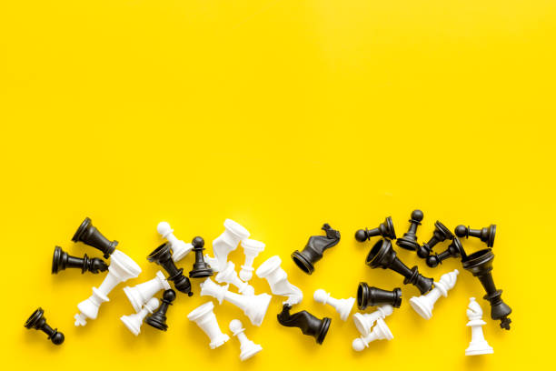 istock Business leadership concept. Black and white chess pieces, top view 1499716810