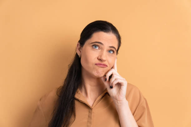 istock worried woman thinking and looking to the side 1499723052