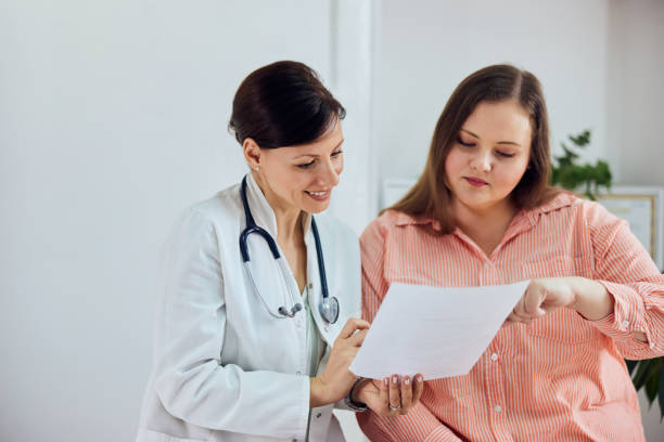 istock A smiling female nutritionist is satisfied with her patient's progress. 1499725205