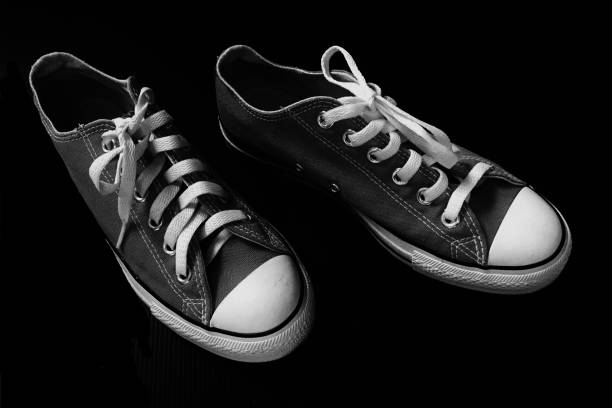istock Sneakers isolated on black background. 1499725898