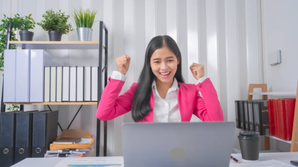 istock Excited Asian bookkeepers doing bookkeeping, accounts payable, assets, book value, equity, inventory, liabilities, cost of goods sold, depreciation, expenses, Gross profit, diversification, liquidity 1499729305