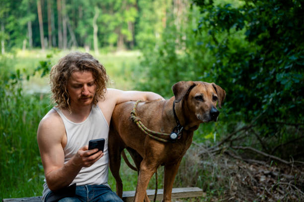istock Men in his 40's with his dog 1499729477