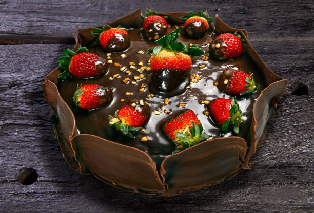 istock Chocolate cake decorated with fresh strawberries 1499734627