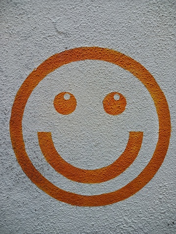 Bandar Sri Damansara, Petaling district, Selangor - 19th June 2023, a smiley face logo on the wall.
