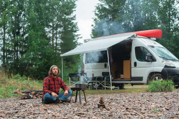 istock Man barbecuing near the camper van in Norway 1499736543